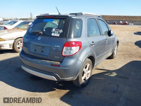 ✅ 2009 Suzuki SX4 Touring AWD • VIN: JS2YB417895101955 • Лот: 43474185. Опубликован ранее на IAAI с пробегом 185 997 миль. Бесплатный доступ к архиву аукционных продаж из США и подробный отчёт об истории автомобиля на DreamBid. Изображение 4.
