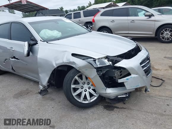 ✅ 2015 Cadillac CTS AWD • VIN: 1G6AW5SX3F0142431 • Lot: 43027413. Listed on IAAI with 125,276 mi. Free auction sales archive from the USA and detailed vehicle history report at DreamBid. Image 6.