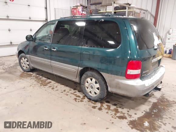 ✅ 2003 Kia Sedona LX • VIN: KNDUP131336390410 • Lot: 41602426. Wystawiony na IAAI z przebiegiem 170 613 mil. Bezpłatny archiwum sprzedaży aukcyjnych z USA i szczegółowy raport historii pojazdu na DreamBid. Zdjęcie 3.