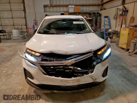 ✅ 2023 Chevrolet Equinox LS • VIN: 3GNAXHEG0PL182520 • Lot: 91026845. Wystawiony na Copart z przebiegiem 31 694 mil. Bezpłatny archiwum sprzedaży aukcyjnych z USA i szczegółowy raport historii pojazdu na DreamBid. Zdjęcie 5.