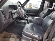 ✅ 1999 Jeep Cherokee Limited • VIN: 1J4FF78S5XL528238 • Lot: 90693785. Wystawiony na Copart z przebiegiem 212 698 mil. Bezpłatny archiwum sprzedaży aukcyjnych z USA i szczegółowy raport historii pojazdu na DreamBid. Zdjęcie 7.