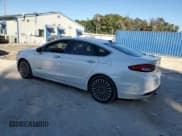 ✅ 2017 Ford Fusion Hybrid Titanium • VIN: 3FA6P0RUXHR249774 • Lot: 92848715. Listed on Copart with 114,397 mi. Free auction sales archive from the USA and detailed vehicle history report at DreamBid. Image 2.