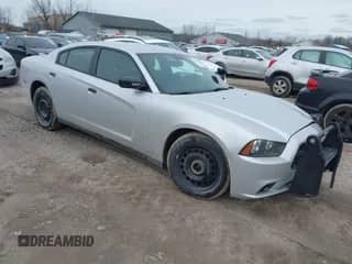 2014 Dodge Charger Police with VIN 2C3CDXKT5EH320245, listed as a IAAI auction lot 41508426 with 131,606 mi miles and . Bid and sale history available at DreamBid. Image 1.