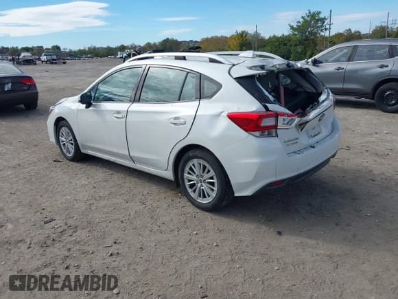 ✅ 2017 Subaru Impreza Premium • VIN: 4S3GTAB60H3749243 • Lot: 43481085. Listed on IAAI with 71,482 mi. Free auction sales archive from the USA and detailed vehicle history report at DreamBid. Image 3.