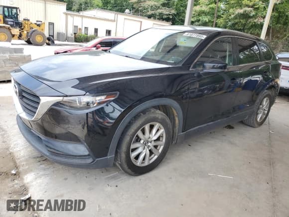 ✅ 2016 Mazda CX-9 Sport • VIN: JM3TCBBY6G0102634 • Lot: 61077895. Listed on Copart with 118,971 mi. Free auction sales archive from the USA and detailed vehicle history report at DreamBid. Image 1.
