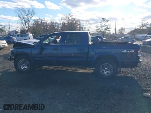 ✅ 2005 Dodge Dakota SLT • VIN: 1D7HW48N75S166543 • Лот: 43679489. Опубликован ранее на IAAI с пробегом 197 288 миль. Бесплатный доступ к архиву аукционных продаж из США и подробный отчёт об истории автомобиля на DreamBid. Изображение 13.