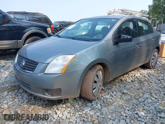 ✅ 2007 Nissan Sentra S • VIN: 3N1AB61E47L717934 • Лот: 42387776. Опубликован ранее на IAAI с пробегом 184 855 миль. Бесплатный доступ к архиву аукционных продаж из США и подробный отчёт об истории автомобиля на DreamBid. Изображение 2.