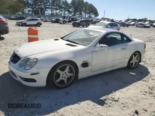 ✅ 2005 Mercedes-Benz SL 55 AMG • VIN: WDBSK74F35F101434 • Lot: 77668344. Listed on Copart with 94,471 mi. Free auction sales archive from the USA and detailed vehicle history report at DreamBid. Image 1.