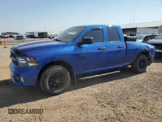 2018 Ram 1500 Tradesman z VIN 1C6RR7FG7JS235759, wystawiony jako Copart lot #65409575 z przebiegiem 93 728 mil mil oraz Szkoda całkowita • Salvage title. Historia ofert i sprzedaży dostępna na DreamBid. Obrazek 1.