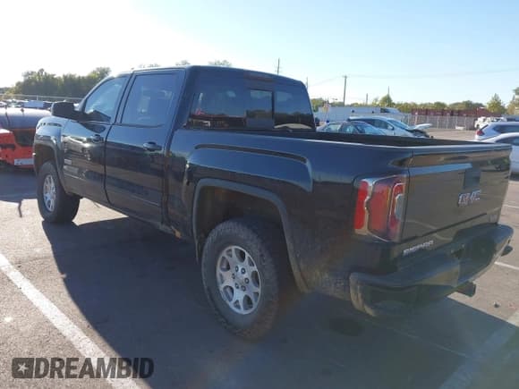 ✅ 2017 GMC Sierra 1500 SLT • VIN: 3GTU2NEJ9HG163733 • Lot: 43472082. Listed on IAAI with 142,828 mi. Free auction sales archive from the USA and detailed vehicle history report at DreamBid. Image 3.