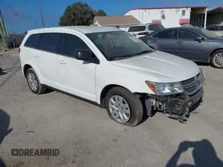 ✅ 2014 Dodge Journey SE • VIN: 3C4PDCAB0ET315332 • Lot: 43542775. Listed on IAAI with 158,494 mi. Free auction sales archive from the USA and detailed vehicle history report at DreamBid. Image 1.