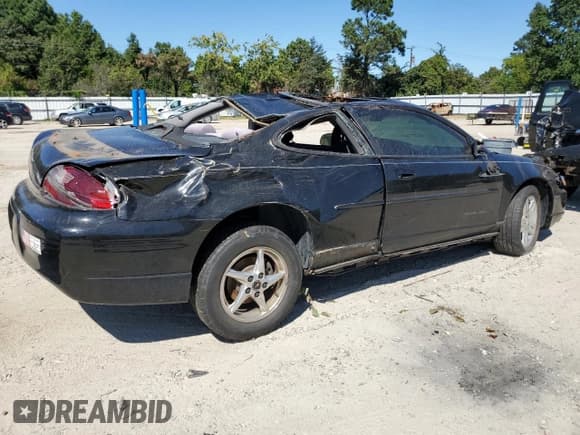✅ 2002 Pontiac Grand Prix GT • VIN: 1G2WP12K62F121100 • Lot: 71308245. Listed on Copart with 138,733 mi. Free auction sales archive from the USA and detailed vehicle history report at DreamBid. Image 3.