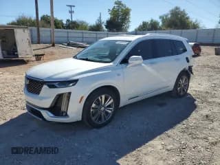 ✅ 2021 Cadillac XT6 Premium Luxury • VIN: 1GYKPCRSXMZ176088 • Lot: 86658515. Listed on Copart with 49,707 mi. Free auction sales archive from the USA and detailed vehicle history report at DreamBid. Image 1.