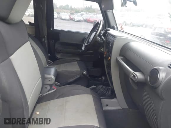 ✅ 2007 Jeep Wrangler Rubicon • VIN: 1J4GA64117L149666 • Lot: 42252464. Listed on IAAI with 100,791 mi. Free auction sales archive from the USA and detailed vehicle history report at DreamBid. Image 5.