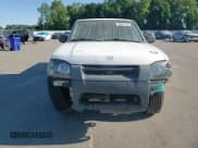 ✅ 2002 Nissan Frontier XE • VIN: 1N6ED29X12C327348 • Lot: 69881135. Listed on Copart with 257,546 mi. Free auction sales archive from the USA and detailed vehicle history report at DreamBid. Image 13.