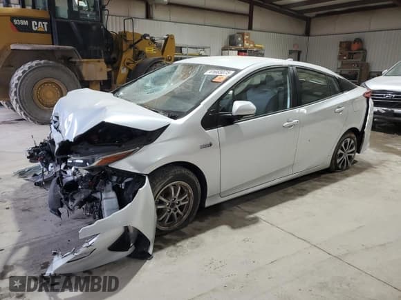 ✅ 2021 Toyota Prius Limited • VIN: JTDKAMFP0M3171451 • Лот: 41665075. Опубликован ранее на Copart с пробегом 53 040 миль. Бесплатный доступ к архиву аукционных продаж из США и подробный отчёт об истории автомобиля на DreamBid. Изображение 1.