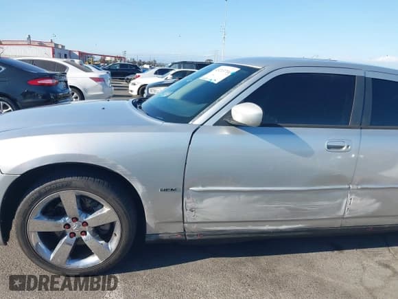 ✅ 2007 Dodge Charger R/T • VIN: 2B3KA53H07H851307 • Лот: 43213716. Опубликован ранее на IAAI с пробегом 181 001 миль. Бесплатный доступ к архиву аукционных продаж из США и подробный отчёт об истории автомобиля на DreamBid. Изображение 12.