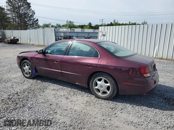 ✅ 2003 Oldsmobile Aurora • VIN: 1G3GS64C134163544 • Lot: 58706705. Listed on Copart with 104,447 mi. Free auction sales archive from the USA and detailed vehicle history report at DreamBid. Image 2.