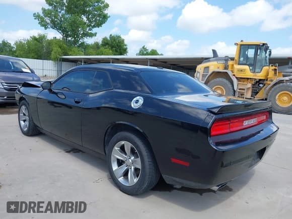 ✅ 2014 Dodge Challenger SXT • VIN: 2C3CDYAG9EH136646 • Lot: 42542559. Listed on IAAI with 169,334 mi. Free auction sales archive from the USA and detailed vehicle history report at DreamBid. Image 3.
