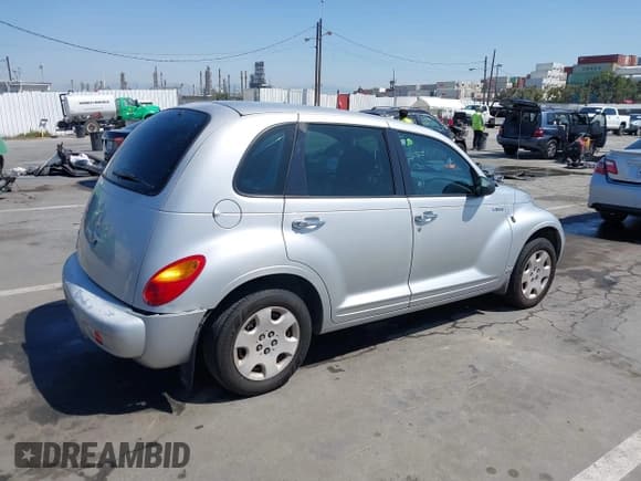 ✅ 2005 Chrysler PT Cruiser • VIN: 3C4FY48B05T569134 • Lot: 41957963. Listed on IAAI with 221,111 mi. Free auction sales archive from the USA and detailed vehicle history report at DreamBid. Image 4.