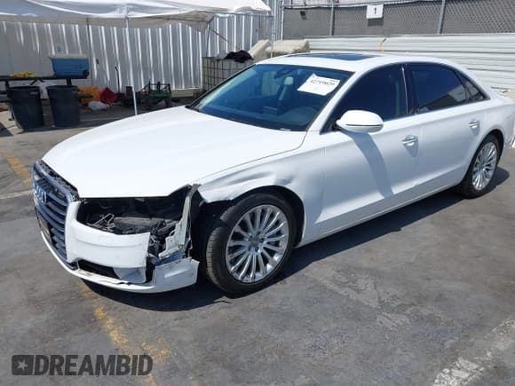 ✅ 2015 Audi A8 4.0T • VIN: WAU32AFD0FN007028 • Lot: 42719029. Wystawiony na IAAI z przebiegiem 75 203 mil. Bezpłatny archiwum sprzedaży aukcyjnych z USA i szczegółowy raport historii pojazdu na DreamBid. Zdjęcie 2.