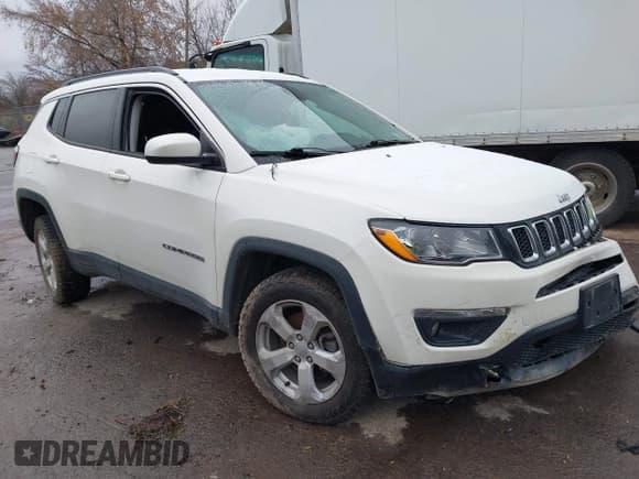 ✅ 2021 Jeep Compass Latitude • VIN: 3C4NJDBB1MT569831 • Lot: 43651737. Listed on IAAI with 87,223 mi. Free auction sales archive from the USA and detailed vehicle history report at DreamBid. Image 1.
