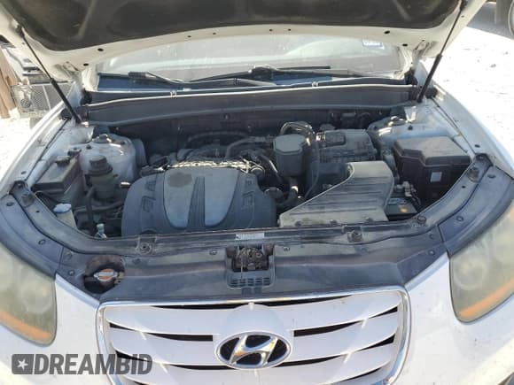 ✅ 2011 Hyundai Santa Fe SE • VIN: 5XYZH4AG4BG059858 • Lot: 77555074. Listed on Copart with 213,721 mi. Free auction sales archive from the USA and detailed vehicle history report at DreamBid. Image 12.