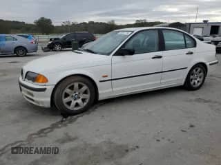 1999 BMW 3 Series 323i with VIN WBAAM3333XKC59029, listed as a Copart auction lot 76257774 with 301,189 mi miles and Salvage title. Bid and sale history available at DreamBid. Image 1.