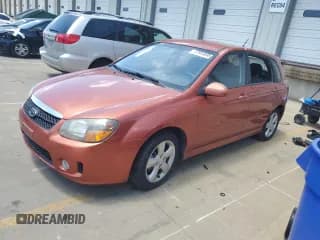 ✅ 2009 Kia Spectra Spectra5 • VIN: KNAFE241795025095 • Lot: 57964095. Wystawiony na Copart z przebiegiem 210 512 mil. Bezpłatny archiwum sprzedaży aukcyjnych z USA i szczegółowy raport historii pojazdu na DreamBid. Zdjęcie 1.