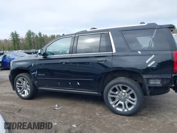 2020 Chevrolet Tahoe Premier z VIN 1GNSKCKJ4LR126699, wystawiony jako IAAI lot #39217949 z przebiegiem 83 245 mil mil oraz . Historia ofert i sprzedaży dostępna na DreamBid. Obrazek 15.