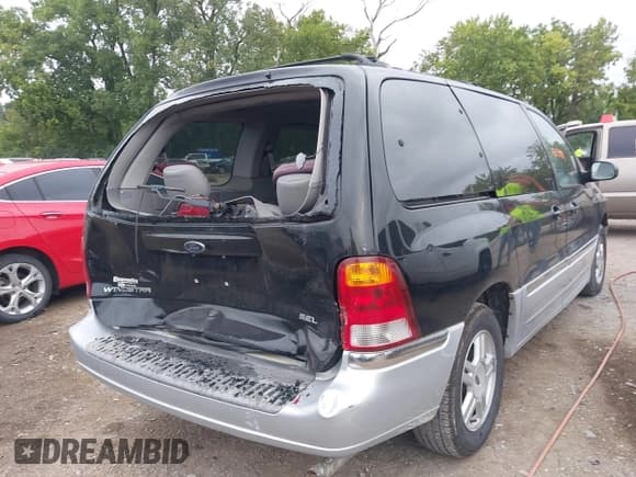 ✅ 2001 Ford Windstar SEL • VIN: 2FMZA53431BA40939 • Lot: 43037783. Listed on IAAI with 143,530 mi. Free auction sales archive from the USA and detailed vehicle history report at DreamBid. Image 4.