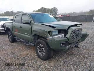 2022 Toyota Tacoma SR5 with VIN 3TMAZ5CN5NM167375, listed as a IAAI auction lot 41527780 with 62,201 mi miles and . Bid and sale history available at DreamBid. Image 1.