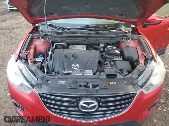 ✅ 2016 Mazda CX-5 Touring • VIN: JM3KE2CY6G0697957 • Лот: 89554065. Опубликован ранее на Copart с пробегом 237 602 миль. Бесплатный доступ к архиву аукционных продаж из США и подробный отчёт об истории автомобиля на DreamBid. Изображение 12.