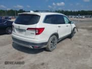 ✅ 2019 Honda Pilot Touring 8-Passenger • VIN: 5FNYF5H9XKB001842 • Lot: 43026784. Listed on IAAI with 114,674 mi. Free auction sales archive from the USA and detailed vehicle history report at DreamBid. Image 4.