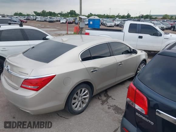 ✅ 2015 Buick LaCrosse • VIN: 1G4GA5G32FF249815 • Lot: 42479560. Listed on IAAI with 112,066 mi. Free auction sales archive from the USA and detailed vehicle history report at DreamBid. Image 14.