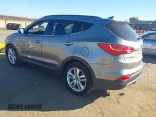 2015 Hyundai Santa Fe z VIN 5XYZWDLA9FG240216, wystawiony jako IAAI lot #43616955 z przebiegiem 203 691 mil mil oraz . Historia ofert i sprzedaży dostępna na DreamBid. Obrazek 3.