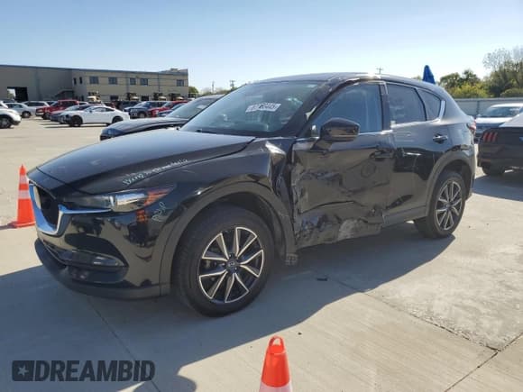 ✅ 2018 Mazda CX-5 Touring • VIN: JM3KFACM0J0310119 • Lot: 87260445. Wystawiony na Copart z przebiegiem 137 160 mil. Bezpłatny archiwum sprzedaży aukcyjnych z USA i szczegółowy raport historii pojazdu na DreamBid. Zdjęcie 1.
