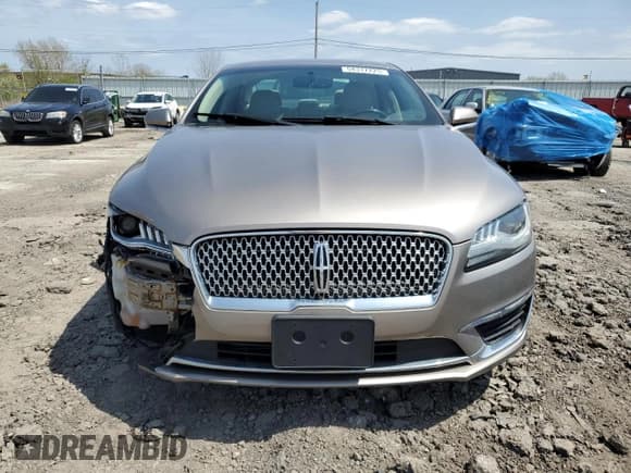 ✅ 2018 Lincoln MKZ Premiere • VIN: 3LN6L5B90JR601352 • Лот: 54317225. Опубликован ранее на Copart с пробегом 76 054 миль. Бесплатный доступ к архиву аукционных продаж из США и подробный отчёт об истории автомобиля на DreamBid. Изображение 5.