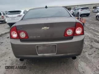 ✅ 2012 Chevrolet Malibu LTZ • VIN: 1G1ZG5E78CF285305 • Lot: 81693474. Listed on Copart with 164,134 mi. Free auction sales archive from the USA and detailed vehicle history report at DreamBid. Image 6.