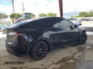 ✅ 2022 Tesla Model Y Performance • VIN: 7SAYGDEF0NF572118 • Lot: 85293695. Listed on Copart with 56,862 mi. Free auction sales archive from the USA and detailed vehicle history report at DreamBid. Image 3.
