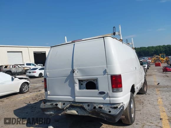✅ 2002 Ford Econoline Cargo Commercial • VIN: 1FTSE34L12HB06624 • Lot: 43004633. Listed on IAAI with 199,587 mi. Free auction sales archive from the USA and detailed vehicle history report at DreamBid. Image 4.