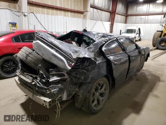 ✅ 2015 Dodge Charger RT • VIN: 2C3CDXCT3FH847121 • Lot: 69619225. Listed on Copart with 65,779 mi. Free auction sales archive from the USA and detailed vehicle history report at DreamBid. Image 3.