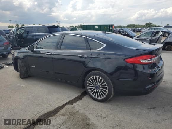 ✅ 2018 Ford Fusion Titanium • VIN: 3FA6P0RU2JR226253 • Lot: 68665825. Wystawiony na Copart z przebiegiem 99 190 mil. Bezpłatny archiwum sprzedaży aukcyjnych z USA i szczegółowy raport historii pojazdu na DreamBid. Zdjęcie 2.