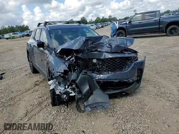 ✅ 2025 Mazda CX-50 Premium • VIN: 7MMVABDYXSN326134 • Лот: 69367495. Опубликован ранее на Copart с пробегом Не указан. Бесплатный доступ к архиву аукционных продаж из США и подробный отчёт об истории автомобиля на DreamBid. Изображение 14.