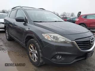 ✅ 2015 Mazda CX-9 Touring • VIN: JM3TB3CV4F0461167 • Lot: 43718045. Wystawiony na IAAI z przebiegiem 154 575 mil. Bezpłatny archiwum sprzedaży aukcyjnych z USA i szczegółowy raport historii pojazdu na DreamBid. Zdjęcie 1.