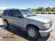 ✅ 1997 Ford Explorer XLT • VIN: 1FMDU32P5VZB36074 • Lot: 57289935. Listed on Copart with 185,654 mi. Free auction sales archive from the USA and detailed vehicle history report at DreamBid. Image 4.