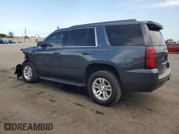 2020 Chevrolet Tahoe LT z VIN 1GNSKBKC7LR117538, wystawiony jako Copart lot #82119935 z przebiegiem 100 701 mil mil oraz Czysty tytuł • Clean title. Historia ofert i sprzedaży dostępna na DreamBid. Obrazek 2.