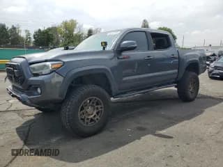 ✅ 2020 Toyota Tacoma SR5 • VIN: 3TMCZ5AN8LM340542 • Lot: 69975105. Listed on Copart with 76,959 mi. Free auction sales archive from the USA and detailed vehicle history report at DreamBid. Image 1.