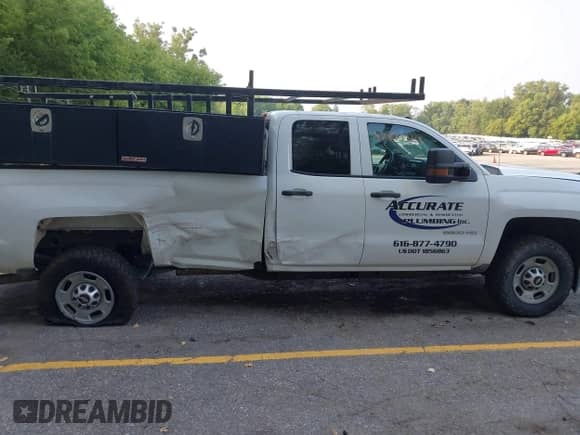 2019 Chevrolet Silverado 2500HD Work Truck z VIN 2GC2KREG1K1180903, wystawiony jako IAAI lot #42877345 z przebiegiem 97 028 mil mil oraz . Historia ofert i sprzedaży dostępna na DreamBid. Obrazek 13.