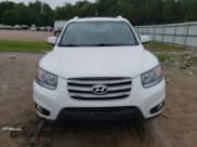 ✅ 2012 Hyundai Santa Fe Limited • VIN: 5XYZK4AG9CG138803 • Lot: 72385414. Listed on Copart with 140,718 mi. Free auction sales archive from the USA and detailed vehicle history report at DreamBid. Image 5.